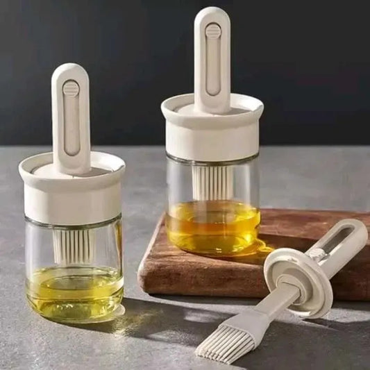 Dispensador de Aceite con Brocha Retráctil